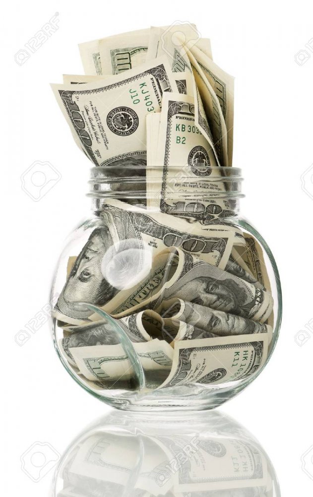 15597774-many-dollars-in-a-glass-jar-isolated-on-white-background.jpg