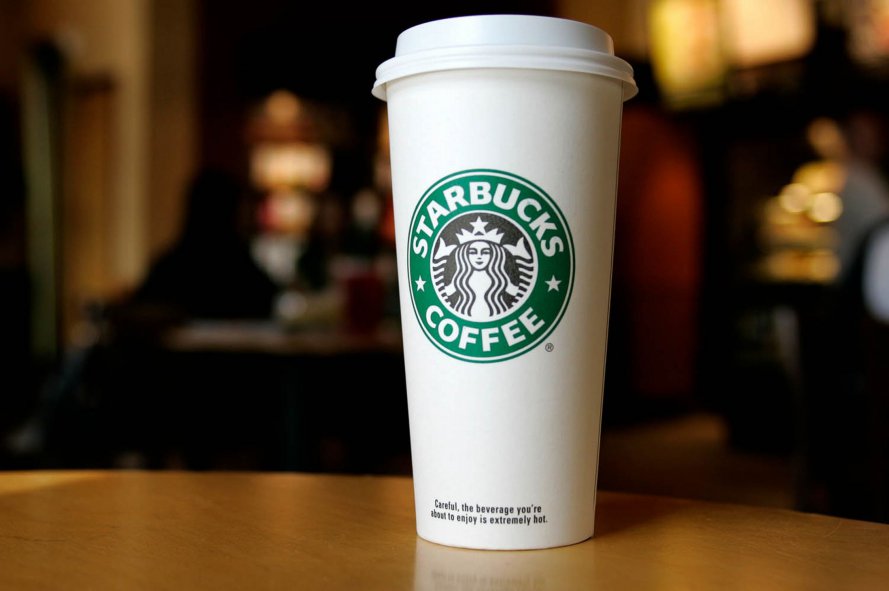 A-cup-displaying-the-Starbucks-Coffee-logo.jpg