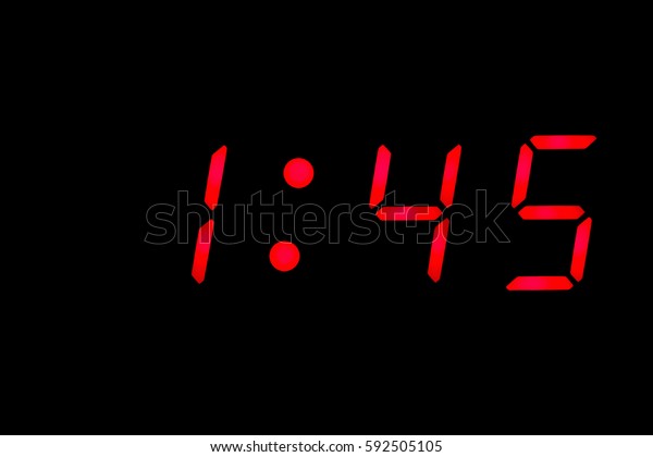 digital-clock-closeup-displaying-145-600w-592505105.jpg