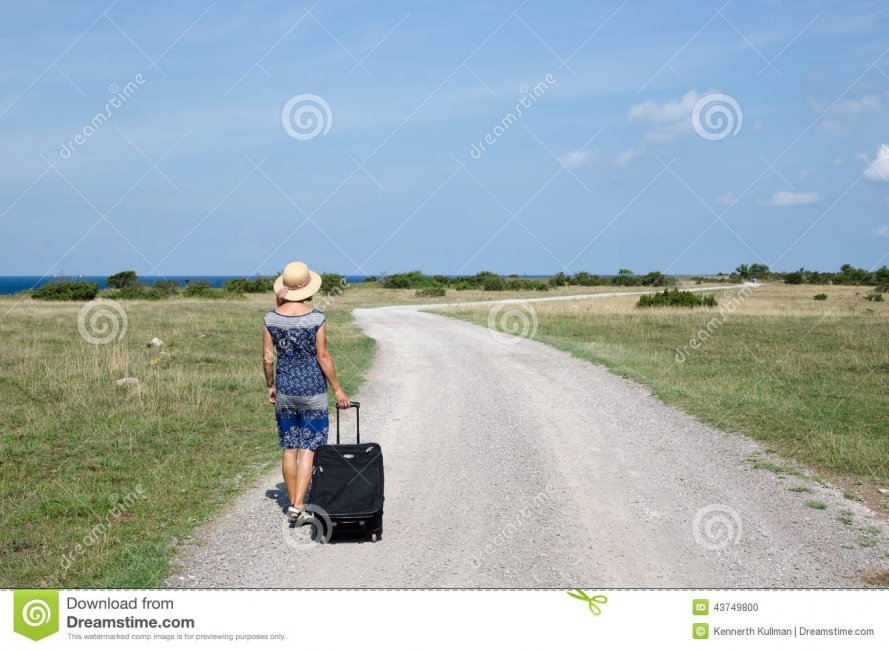 woman-walking-away-gravel-road-traveling-suitcase-country-sunny-landscape-43749800.jpg